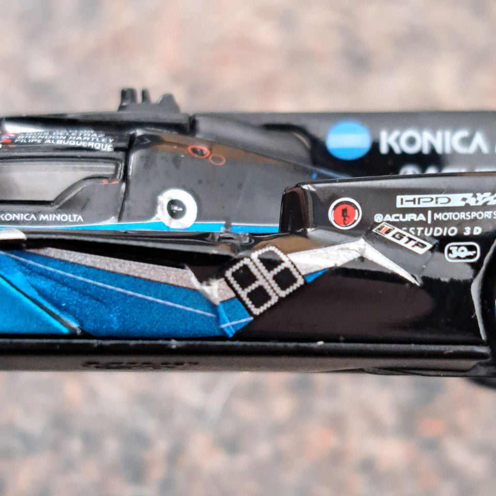 Mini GT Acura ARX-06 GTP #10 IMSA 2023 (1:64) (685) (Decal Defect)