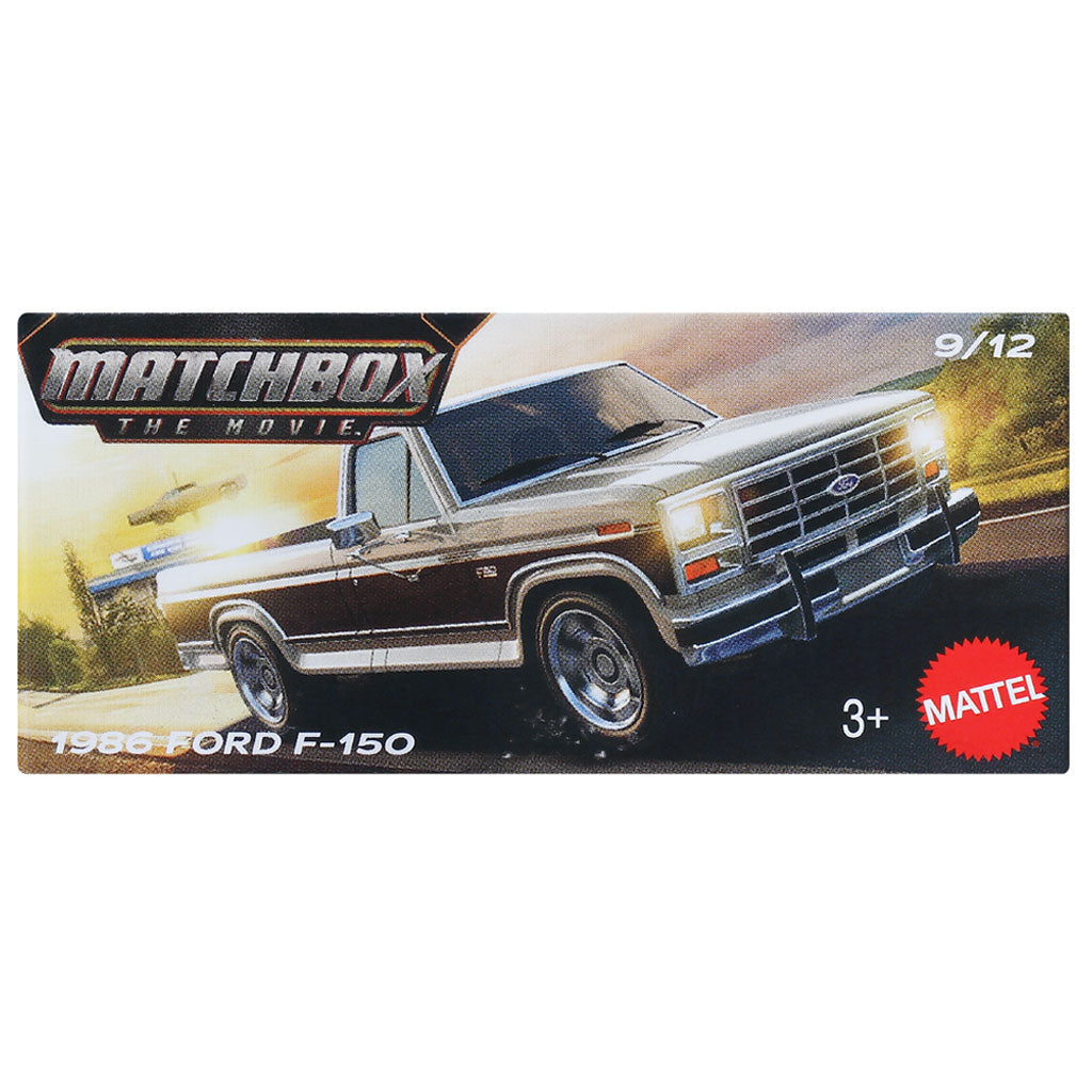 Mattel Matchbox The Movie 1986 Ford F-150 model car box art, featuring a dark brown and silver pickup truck on a road with sunset lighting. Includes 'Matchbox The Movie' logo, '1986 FORD F-150' text, '9/12' scale, '3+' age rating, and a red 'Mattel' logo.